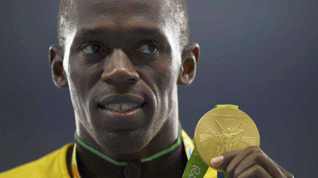 Usain Bolt devolvió medalla retirada por positivo de compañero