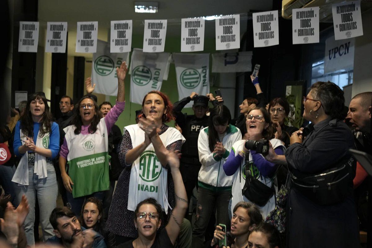 State workers protest against the dismissal of employees at the National Institute against Discrimination, Xenophobia and Racism in Buenos Aires, Argentina, on April 3, 2024. (Photo by Natacha Pisarenko/AP)