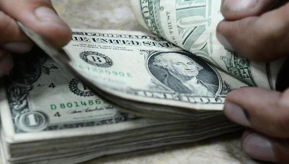 El dólar en el mercado paralelo se cotizó en la jornada previa a 3,320.74 bolívares soberanos. (Foto: AFP)