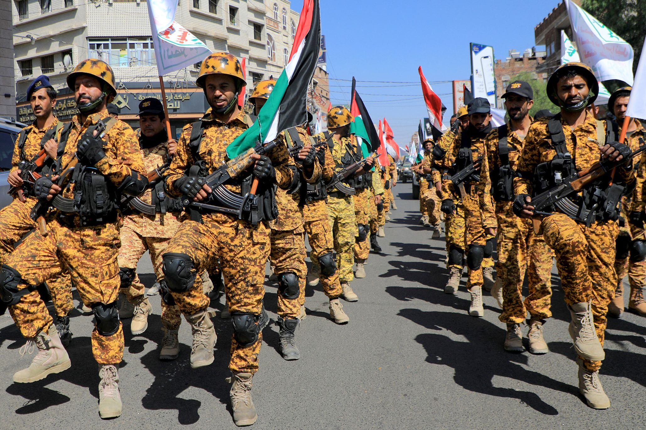 Armed forces loyal to Yemen's Houthi rebels march through the streets of Sana'a in a show of solidarity with the Palestinians on October 15, 2023. (Photo by MOHAMMED HUWAIS/AFP).