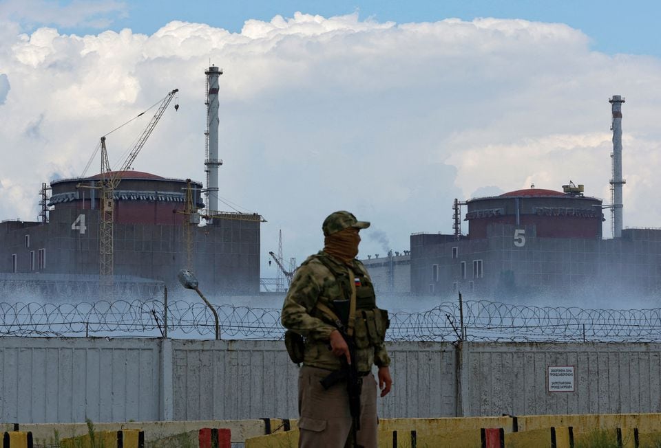 A Russian serviceman stands guard near the Zaporizhzhia nuclear power plant in Ukraine on August 4, 2022. (REUTERS / Alexander Ermochenko).