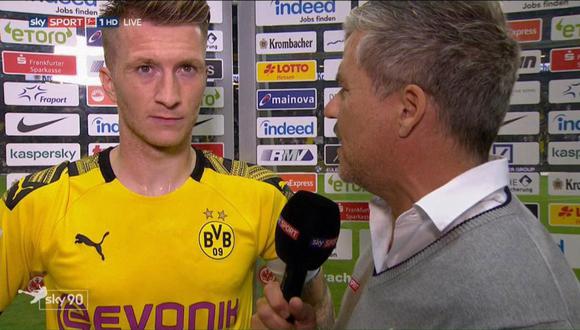 Marco Reus, segundos antes, de arremeter contra el periodista de Sky Sport. (Foto: captura de video)