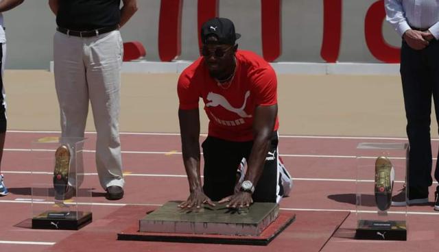 Usain Bolt estampó sus huellas en el estadio de atletismo de Lima 2019. (Foto: Alonso Chero)