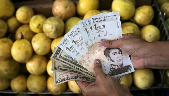 Dólar Today y Monitor Dólar: consulta el tipo de cambio en Venezuela hoy, viernes 12 de mayo de 2023 | Foto: AFP / Referencial