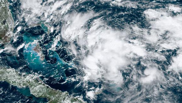 Imagen satelital muestra un área del clima perturbado donde es probable que se convierta en una depresión tropical según la Administración Nacional Oceánica y Atmosférica (NOAA). (Foto: AFP).