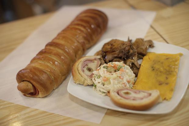 The flagship Christmas dish of Pan del Portu that has hallaca, ham bread, chicken salad and pernil, which is a pork seasoned with Venezuelan style that is eaten at Christmas, but they ask for it all year round.  