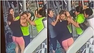 Mujeres son captadas peleándose en un gimnasio por una máquina de pesas