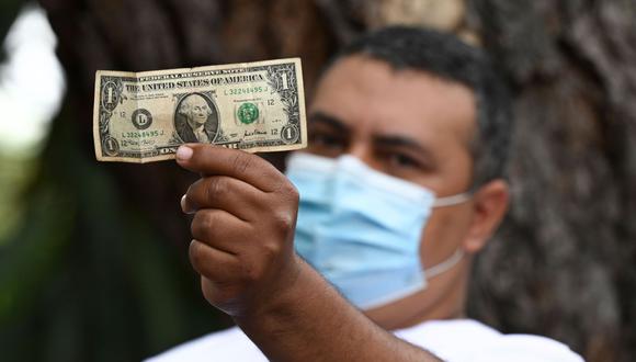 Sepa aquí a cuánto se cotiza el dólar en Venezuela este 10 de febrero de 2021. (Foto: AFP)