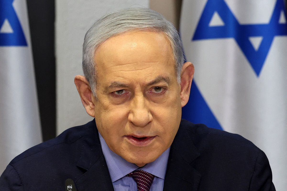 Israeli Prime Minister Benjamin Netanyahu presides over a cabinet meeting in Kirya, which houses the Israeli Ministry of Defense, in Tel Aviv on December 31, 2023. (Photo by ABIR SULTAN/POOL/AFP)
