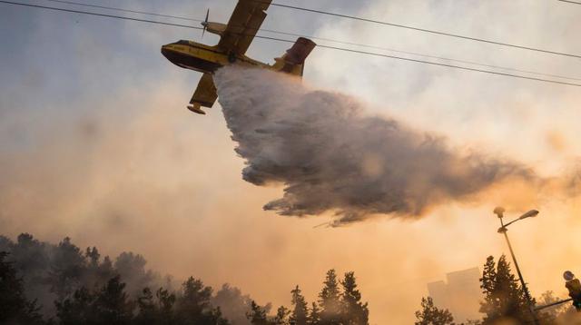 Israel: Miles evacúan ciudad de Haifa por incendios forestales - 12