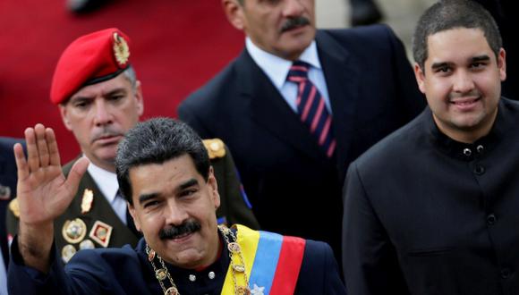 Nicolás Maduro Guerra y su padre, el presidente de Venezuela. (Foto: Reuters)