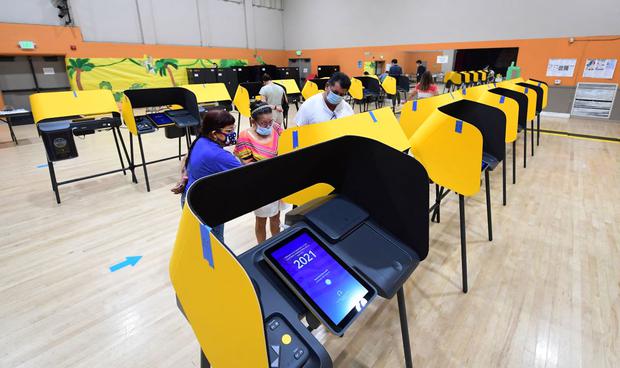 People vote at the Lincoln Park Senior Center in Los Angeles, California, on September 13, 2021.