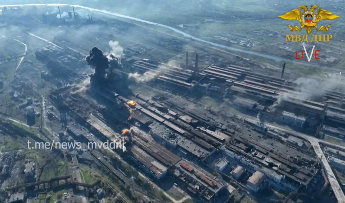 This video capture released on May 4, 2022 by the Ministry of Internal Affairs of the self-proclaimed Donetsk People's Republic (DNR) shows explosions at the Azovstal steel plant in Mariupol, Ukraine.  (AFP).