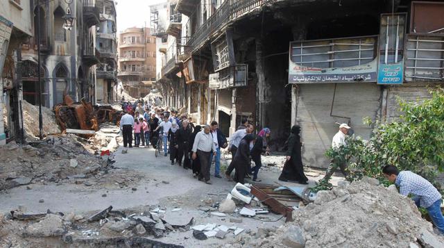 Siria: Miles vuelven a Homs y encuentran sus casas destruidas - 2
