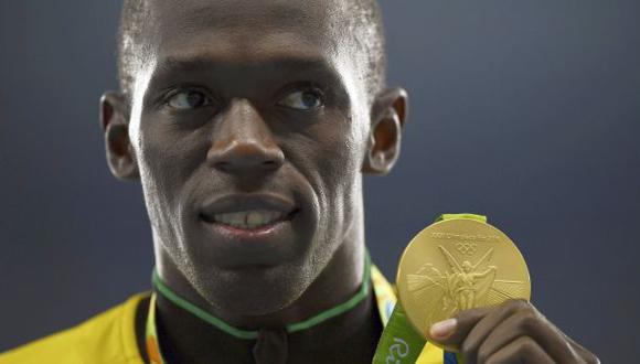 Usain Bolt devolvió medalla retirada por positivo de compañero