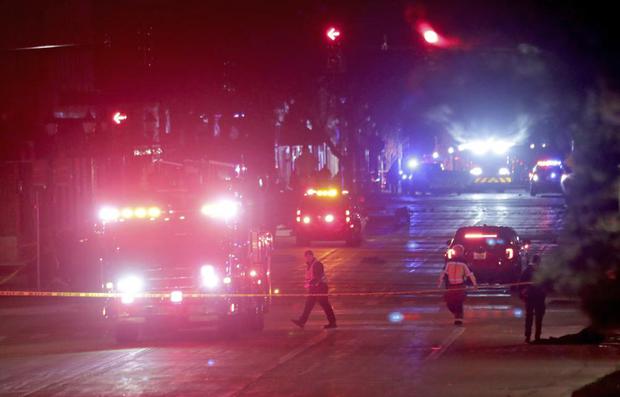 Police are investigating at the scene of an accident involving multiple people and injuries at a festive parade in Waukesha, Wisconsin, on Sunday, November 21, 2021 (Mike De Sisti / Milwaukee Journal-Sentinel via Globe Live Media).