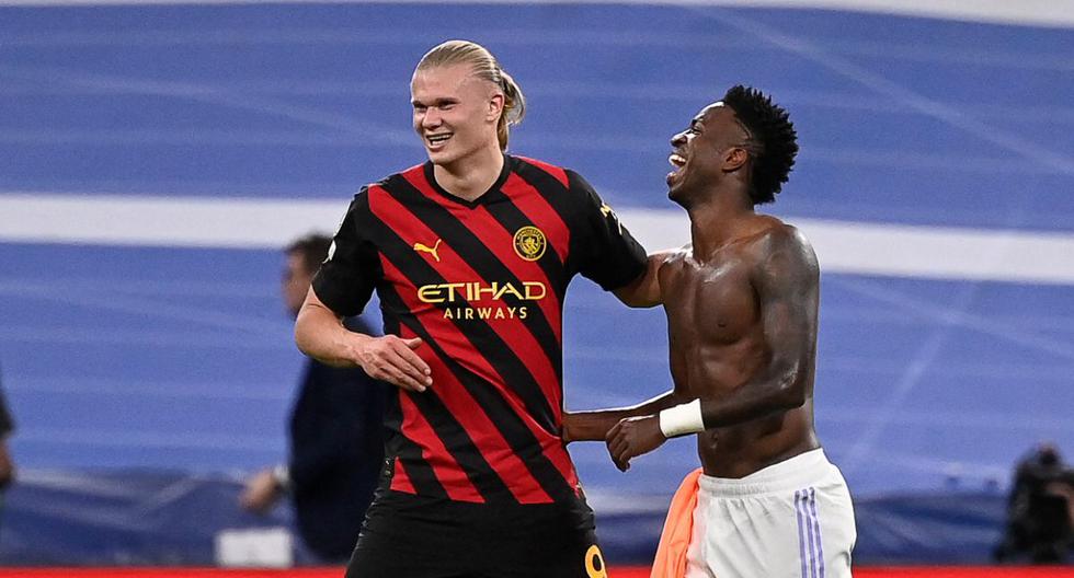 Haaland y Vinícius terminaron en un abrazo la primera semifinal en el Bernabéu. (Foto: AFP)