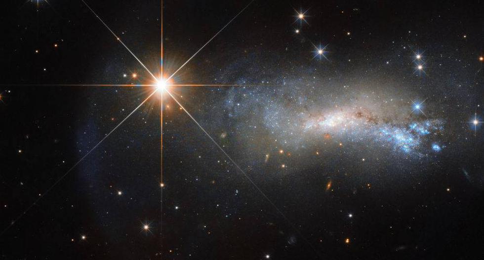 Una galaxia opacada por una sola estrella. (Foto: NASA)