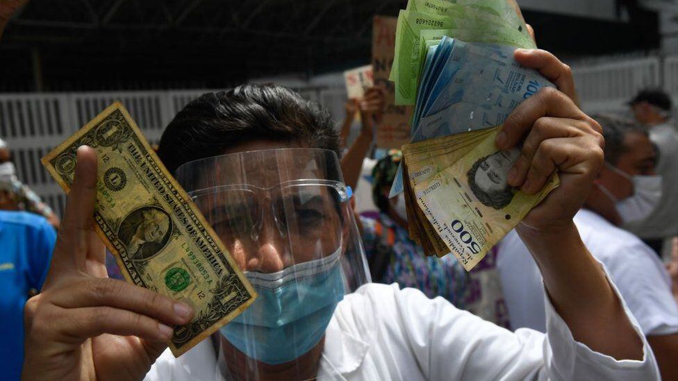Those who charge in bolivars are the hardest hit.  (Photo: Getty Images)