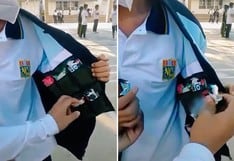 Estudiante convierte su casaca en un “quiosco” para vender en su colegio y así ayudar a su familia