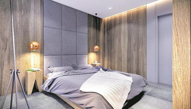 Elige una cabecera sencilla y lineal. En este espacio se enmarcó la zona de la cama con un tapiz acolchado de piso a techo. (Foto: Plasterlina)