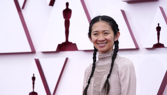 Chloe Zhao en la alfombra roja. La realizadora nacida en China ha hecho historia por ser la primera mujer de ascendencia asiática en ganar el premio a Mejor directora por "Nomadland". (Foto: Chris Pizzello / AFP)