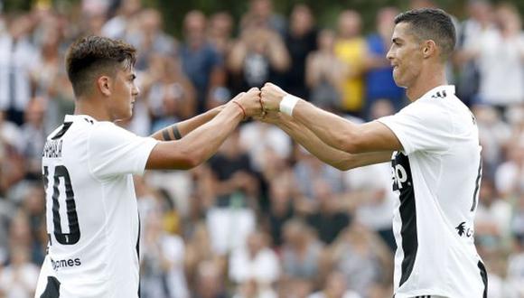 Cristiano Ronaldo y Paulo Dybala. (Foto: AP)