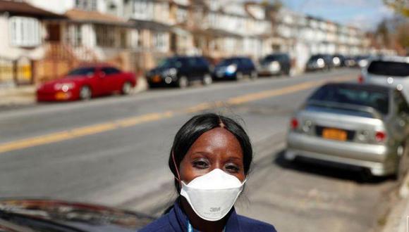 Ajayi, de 47 años, trabaja sola en la nueva primera línea de la pandemia de coronavirus. (Foto: Reuters)