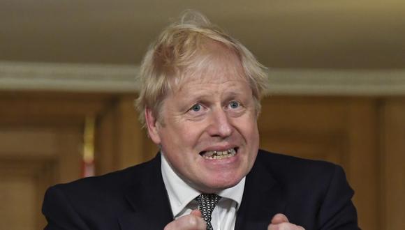 El primer ministro británico, Boris Johnson, habla durante una conferencia de prensa para anunciar el confinamiento en Inglaterra con el fin de frenar los contagios de coronavirus. (Foto de Alberto Pezzali / POOL / AFP).