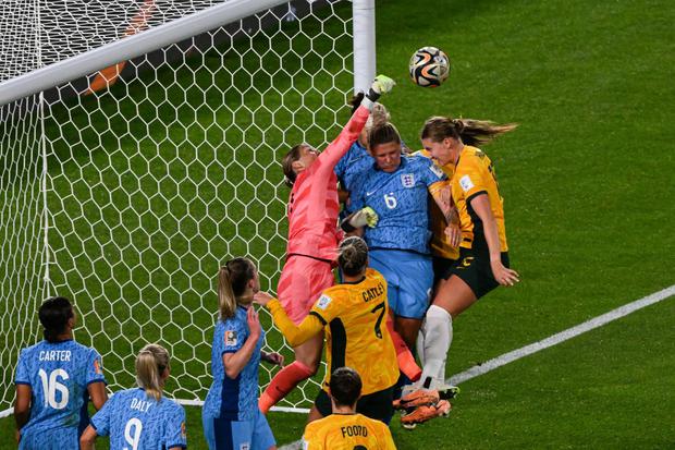 England's goalkeeper #01 Mary Earps clears the ball during the Australia and New Zealand 2023 Women's World Cup semi-final football match between Australia and England at Stadium Australia in Sydney on August 16, 2023. (Photo by Saeed KHAN / AFP)