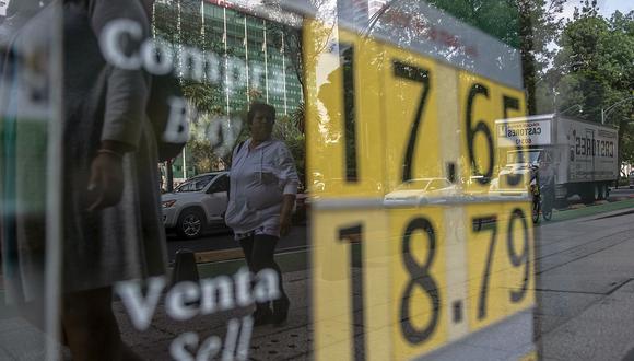 Hoy el precio del dólar llegaba a 19,8580 pesos en el mercado de México. (Foto: AFP)