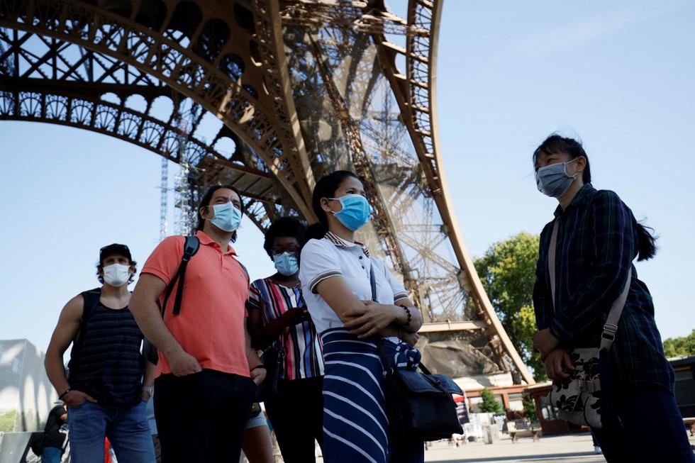 La Torre Eiffel, el monumento más famoso de París visitado anualmente por siete millones de personas, reabrió sus puertas este jueves, después de un cierre de tres meses debido a la pandemia del nuevo coronavirus. (Thomas SAMSON / AFP)