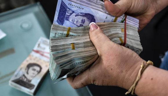 ¿Por qué este billete venezolano vale 47 mil dólares? | En la siguiente nota te contaremos lo que debes saber sobre el billete venezolano que puede llegar a valer 47 mil dólares, entre otros datos relacionados al tema.  | Foto: AFP