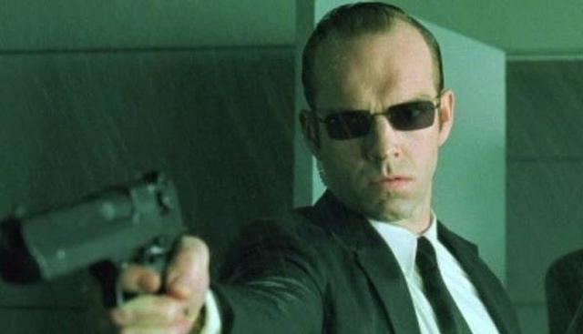 El agente Smith, antagonista de la saga, es un personaje ficticio de la trilogía cinematográfica “The Matrix". (Foto: Warner Bros)