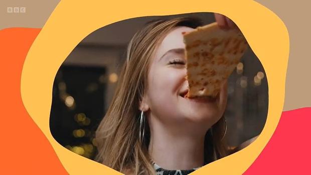 Happy girl eating pizza