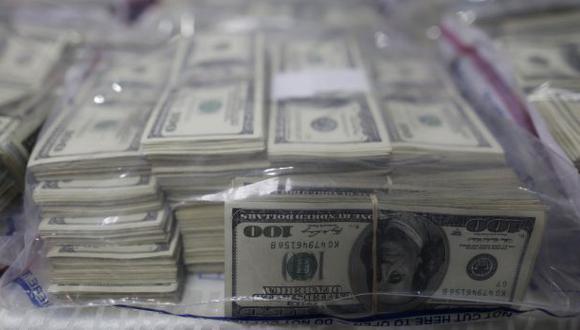 Detienen a peruano en Nueva York con 121.300 dólares falsos