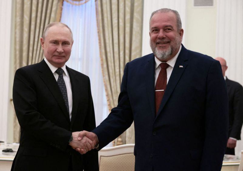 Vladimir Putin, President of Russia, and Manuel Marrero Cruz (right), Prime Minister of Cuba, at a meeting in Moscow in June.  (Getty Images).