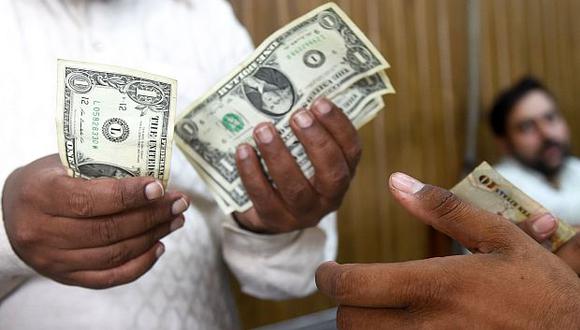 El dólar cotizaba a 6.346,65 bolívares soberanos en el mercado informal de Venezuela este jueves. (Foto: AFP)