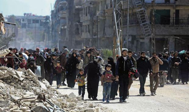 Syrian civilians are evacuated from the Eastern Ghouta region, the main opposition stronghold around Damascus, the Syrian capital. The area was recovered by the Bashar al Assad regime in early 2018. (Photo: AFP)
