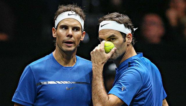 Prague (Czech Republic), 23/09/2017.- Switzerland's Roger Federer (R) and Spanish Rafael Nadal (L) of the Team Europe in action during the Laver Cup tennis tournament in Prague, Czech Republic, 23 September 2017. The first Laver Cup is held in Prague, Czech Republic, from 22 to 24 September 2017. It is a three-day tournament pitting a team of the six best tennis players from Europe against six opponents from the rest of the world. The tournament has been named in honor of Australian tennis legend Rod Laver. (Rep˙blica Checa, Tenis, Praga, Suiza) EFE/EPA/MILAN KAMMERMAYER