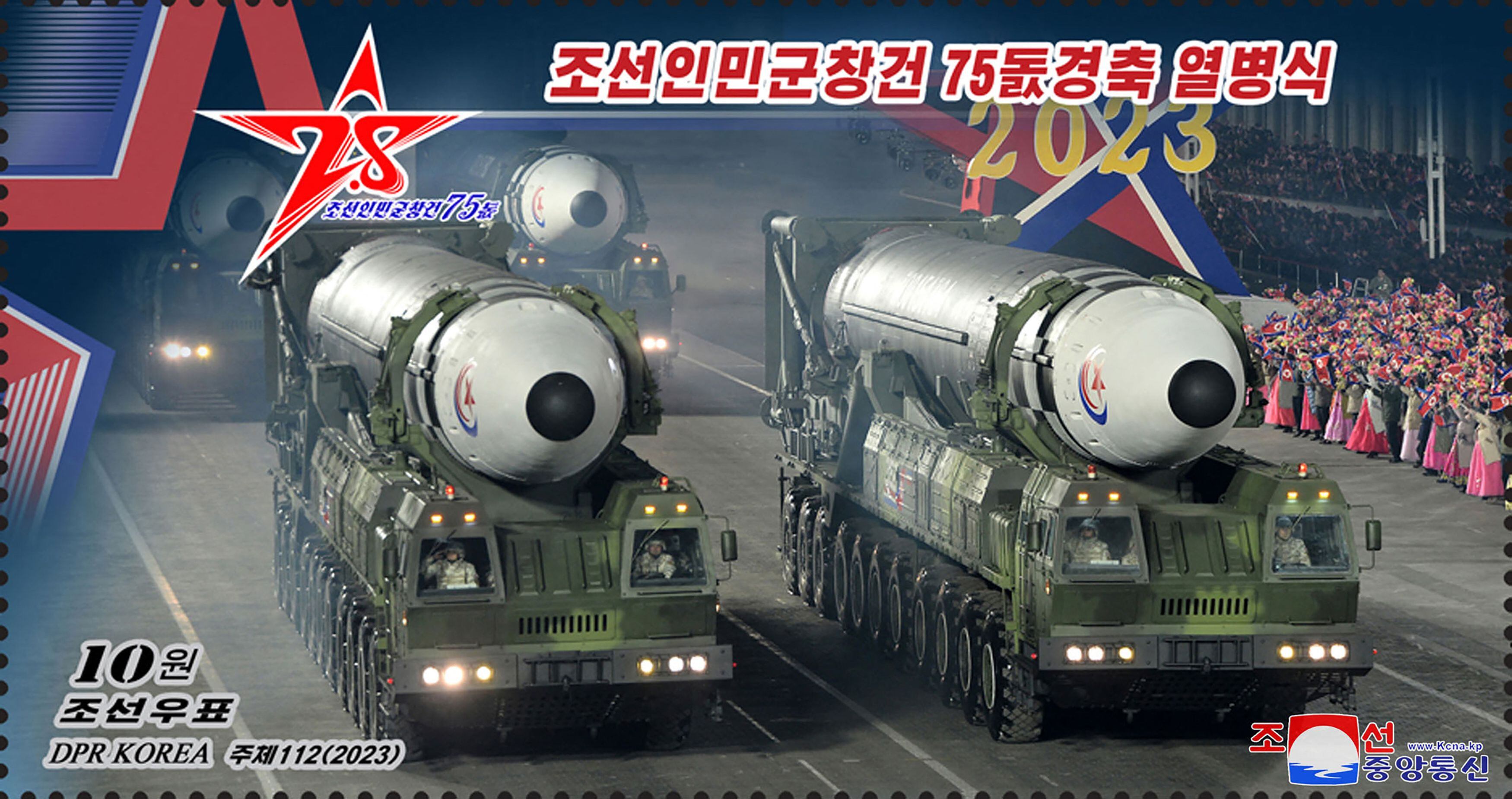 This image released by the Korean Central News Agency (KCNA) shows a postage stamp issued in North Korea with an illustration of the recent parade of intercontinental ballistic missiles (ICBMs) / AFP.