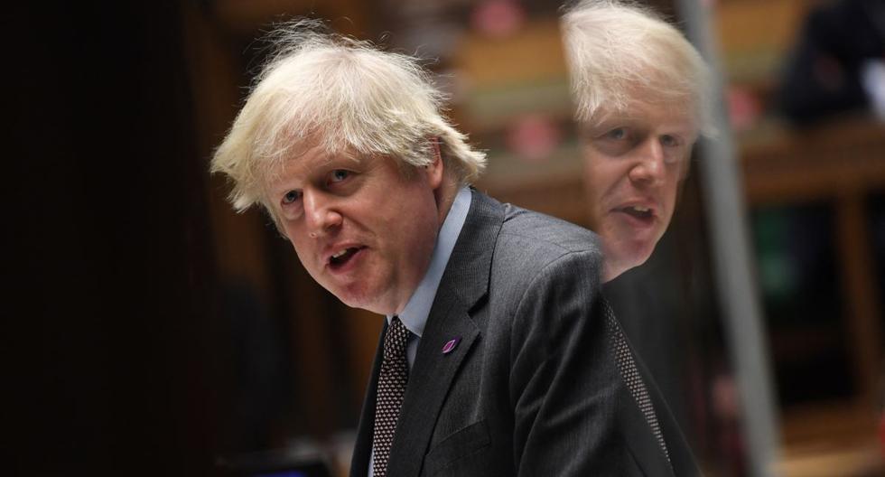 Una fotografía publicada por el Parlamento del Reino Unido muestra al primer ministro británico, Boris Johnson, participando en la sesión de preguntas semanales, el 27 de enero de 2021. (JESSICA TAYLOR / PARLAMENTO DEL REINO UNIDO / AFP).