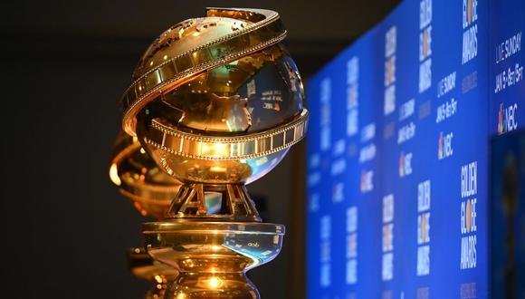 (FILES) In this file photo taken on December 9, 2019 Golden Globe trophies are set by the stage ahead of the 77th Annual Golden Globe Awards nominations announcement at the Beverly Hilton hotel in Beverly Hills. - Hollywood's biggest party, the Golden Globes, kicks off the showbiz awards season Sunday, with streaming giant Netflix expected to be popping champagne corks through the night. (Photo by Robyn BECK / AFP)
