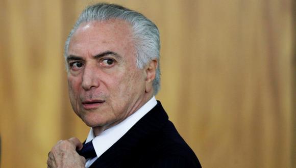 El documento señala que Michel Temer "obstaculizó la investigación" al "incentivar" el mantenimiento de "pagos ilegítimos" al ex diputado Eduardo Cunha. (Foto: Reuters)