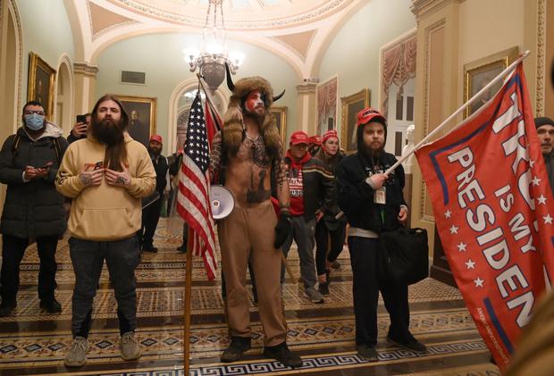 In this file photo taken on January 6, 2021, supporters of US President Donald Trump enter the US Capitol.