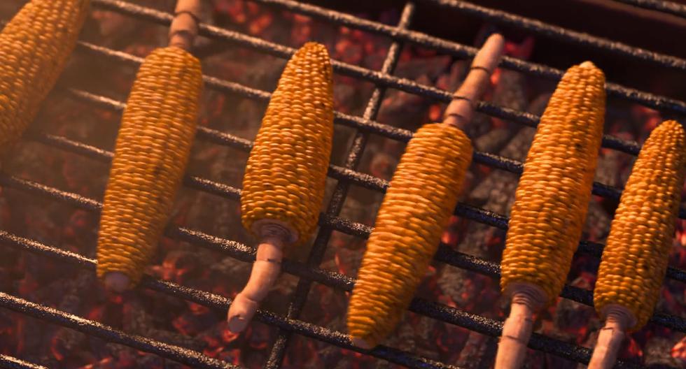 One of the first traditional dishes seen in "Encanto": the delicious corn on the cob being roasted over high heat.  (Photo: Screenshot)