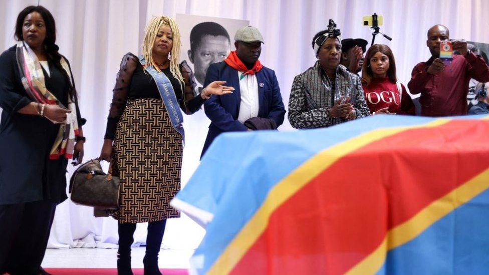 The coffin of the hero of the independence of the Democratic Republic of the Congo, Patrice Lumumba, during a tribute at the Congolese Embassy in Brussels, on June 21, 2022. (GETTY IMAGES)