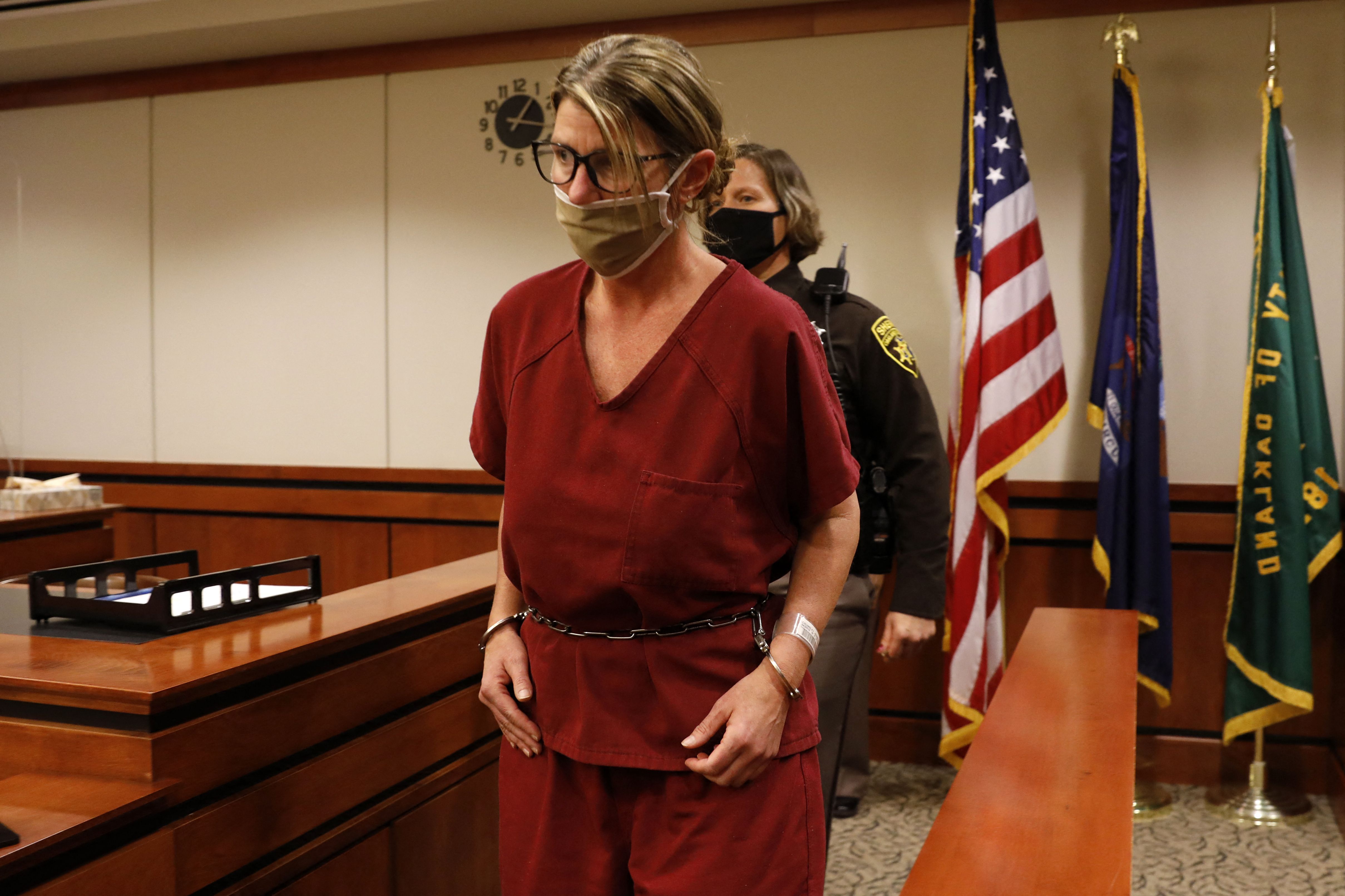 Jennifer Crumbley, 43, mother of Ethan Crumbley, in court on December 14, 2021. (Photo by JEFF KOWALSKY/AFP).