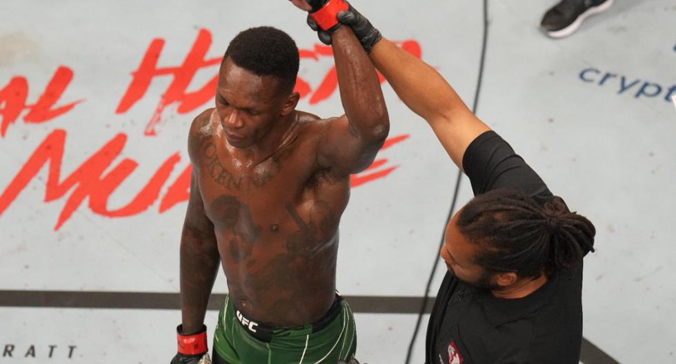 Adesanya retiene el título de peso medio luego de ganar a Cannonier. (Foto: UFC)