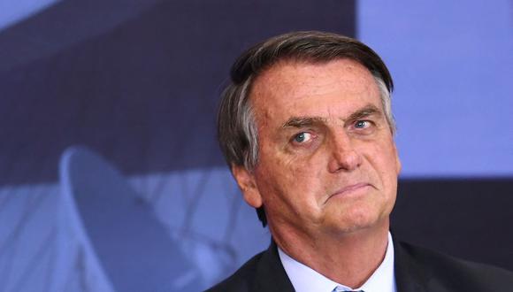 En esta foto tomada el 14 de septiembre de 2021, el presidente de Brasil, Jair Bolsonaro, hace un gesto durante la ceremonia del Premio de Comunicaciones Marechal Rondon en el Palacio Planalto en Brasilia. (EVARISTO SA / AFP).